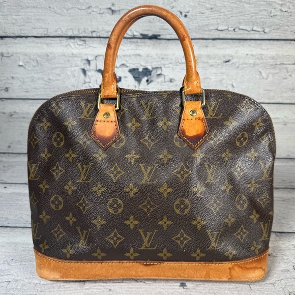 Louis Vuitton Alma Brown Monogram Canvas Leather Handbag - Picture 2 of 16